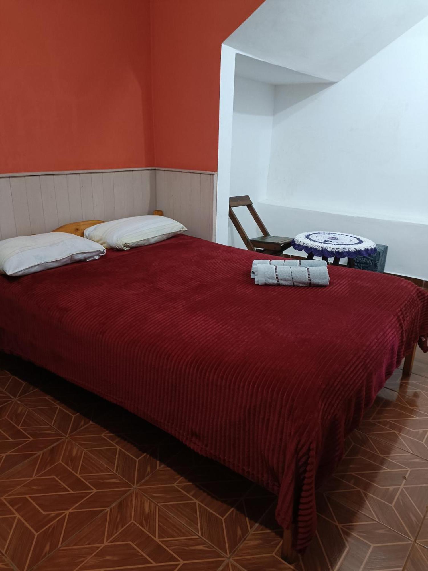 Hostel El Amanecer ปูแอร์โตอีกวาซู ห้อง รูปภาพ